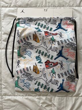 Nike Jordan Graphic Drawstring Bag in White with Multicolor Accents